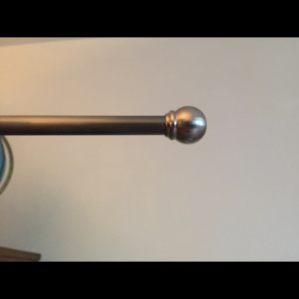 Umbra curtain rod from Home Depot. Never used!